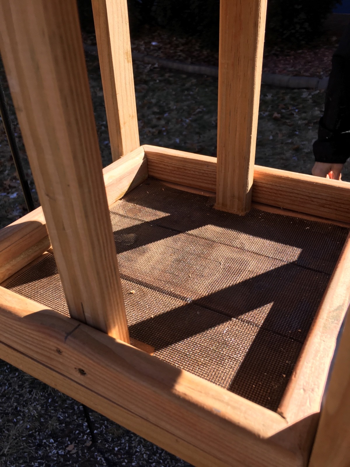 Hand mde rustic bird feeder fly through