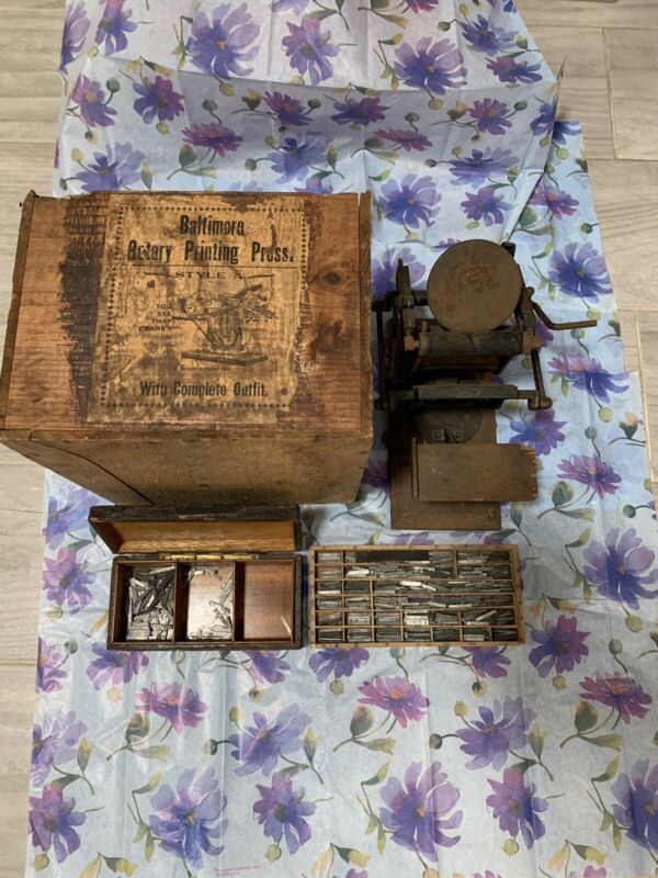 antique baltimore rotory printing press with original wood crate and letters
