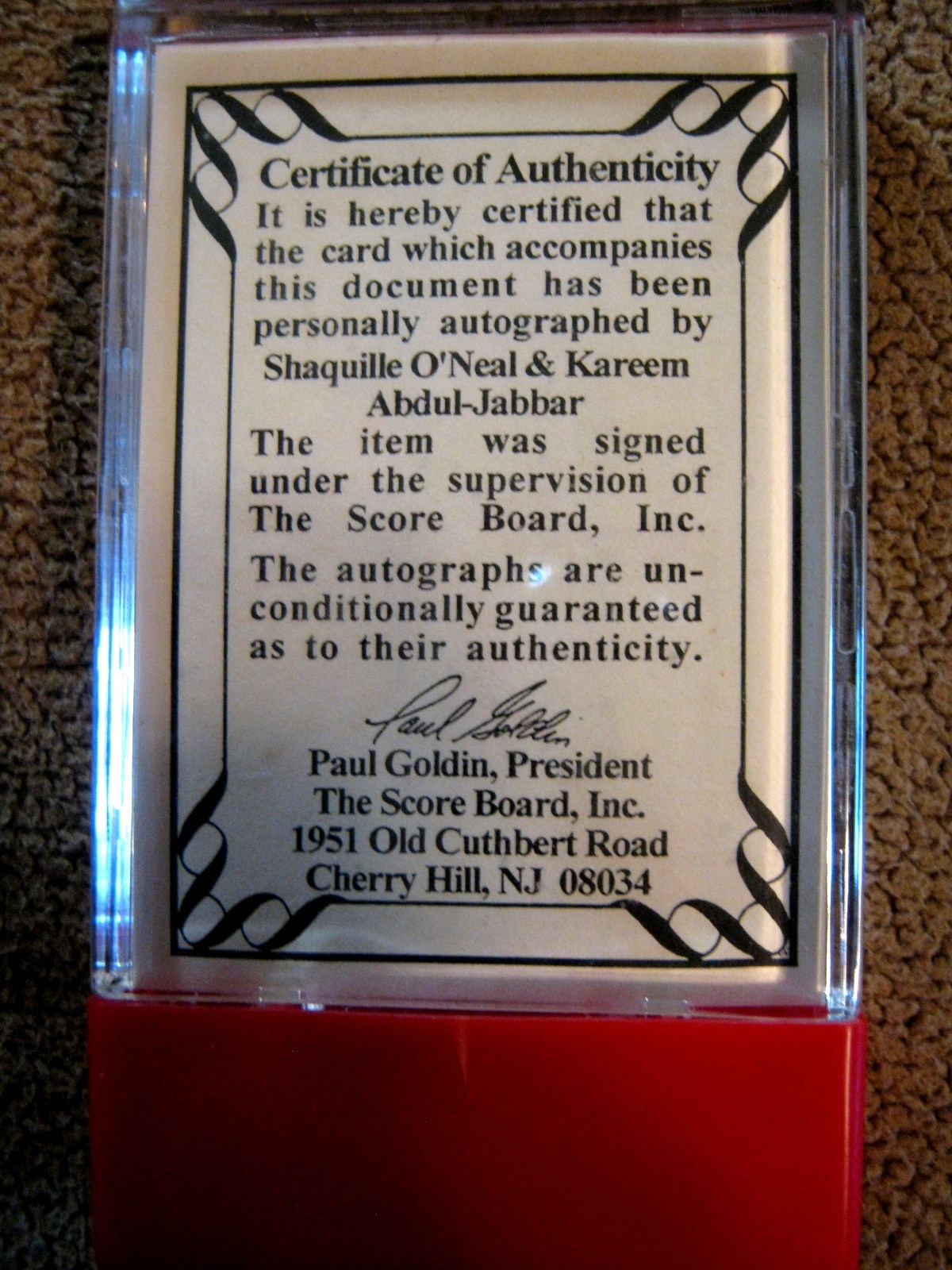 Autographed sport card of Shaquille O'Neal and Abjul Jabbar