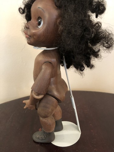 FRED THOMPSON CARVED BLACK CHILD