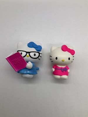 HELLO KITTY READING HELLO KITTY IN PINK DRESS