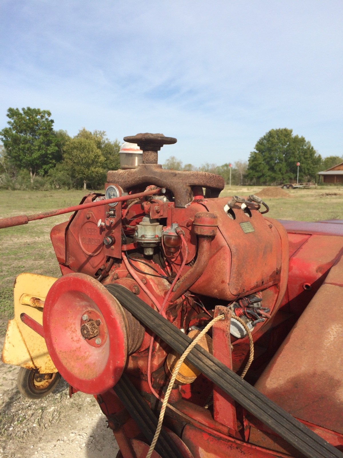 New Holland square baler. One owner. Engine powered.