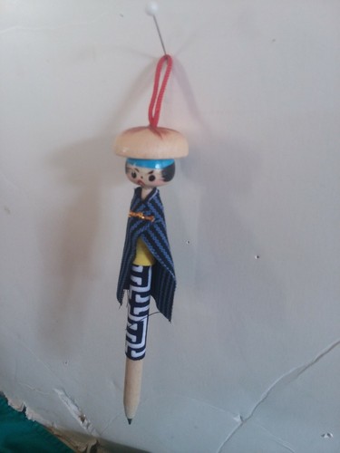 Angry China Man Wood Pen Ornament