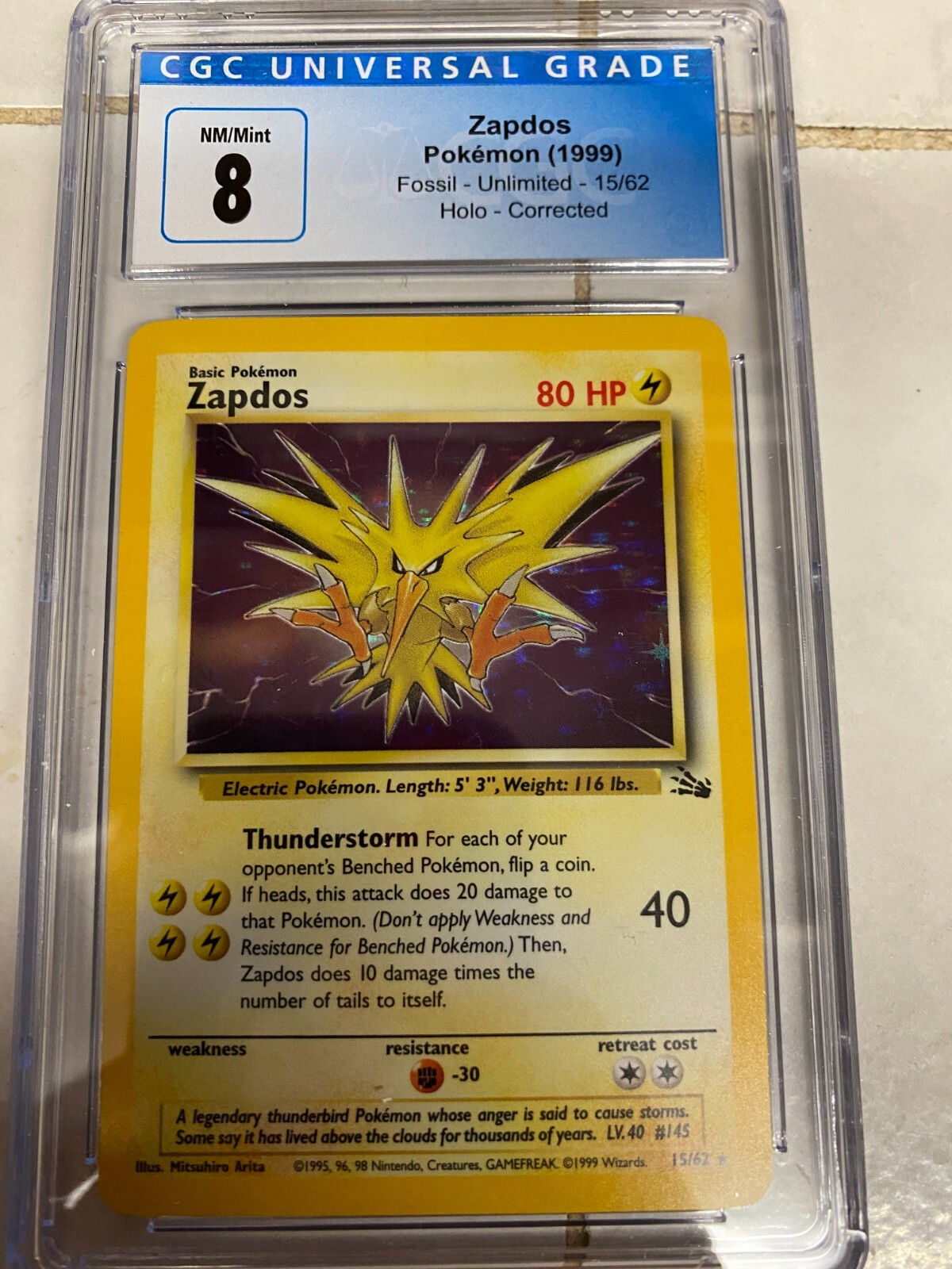 Zapdos 15/62 - Pokémon TCG Fossil Set Rare Holo *CGC GRADE 8 Zapdos 15/62 - Pokémon TCG Fossil Set Rare Holo *CGC GRADE 8