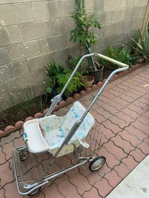 antique metal stroller