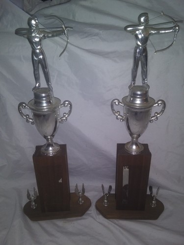 Collection of 10 vintage mens archery trophies