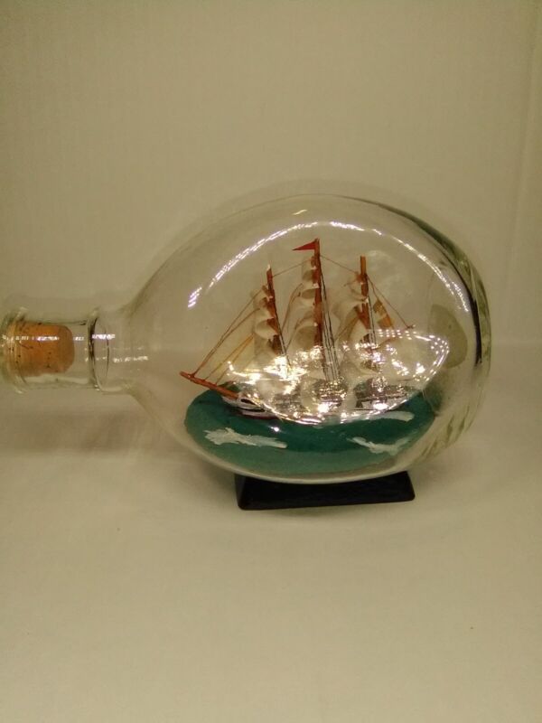 Ship in Corked Triangle Indented Bottle Nautical Voyage Sailboat On Stand 6.5"