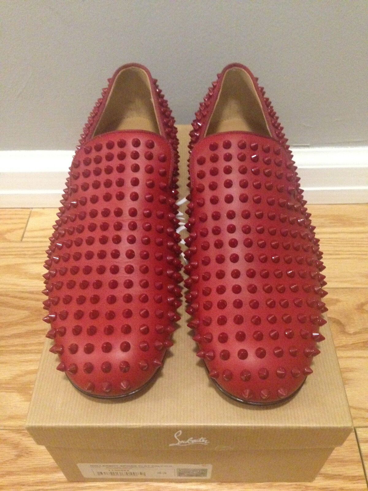Christian Louboutin Rollerboy Spikes Flat in RED | eBay Christian Louboutin Rollerboy Spikes Flat in RED | eBay