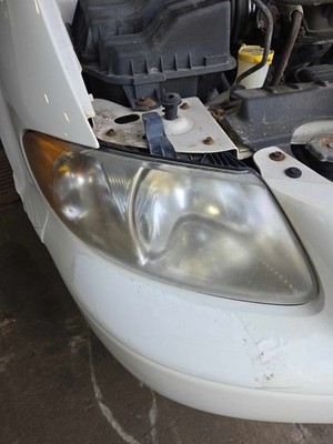 Used Right Headlamp Assembly fits: DODGE CARAVAN Right 01 02 03 04 05 06 07