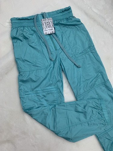 

Free People Tell Me About It Крутые спортивные брюки с нейлоновой молнией  128 долларов США, Синий