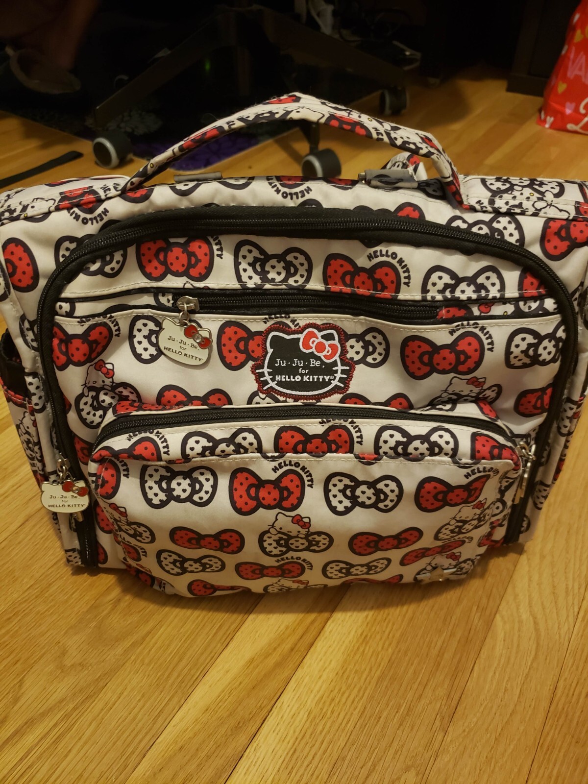 Jujube Hello Kitty Peek a Bow BFF Diaper Bag with matching Jujube Hello Kitty Peek a Bow BFF Diaper Bag with matching