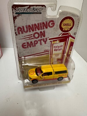GREENLIGHT  RUNNING ON EMPTY 2016 FORD F-150 WITH SHELL SOME SHELF WEAR  (BOX1)