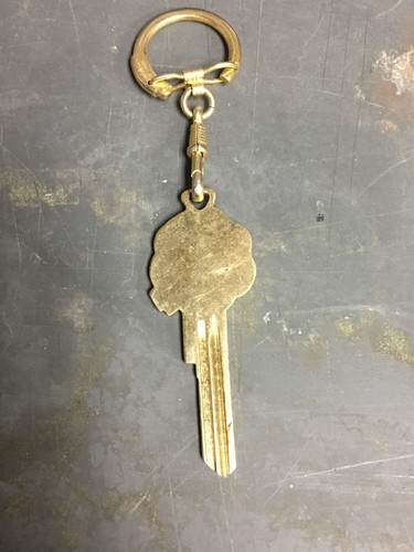 Vintage Designer Chrysler Key Blank And Key Chain Multi Colored W Chrysler Logo