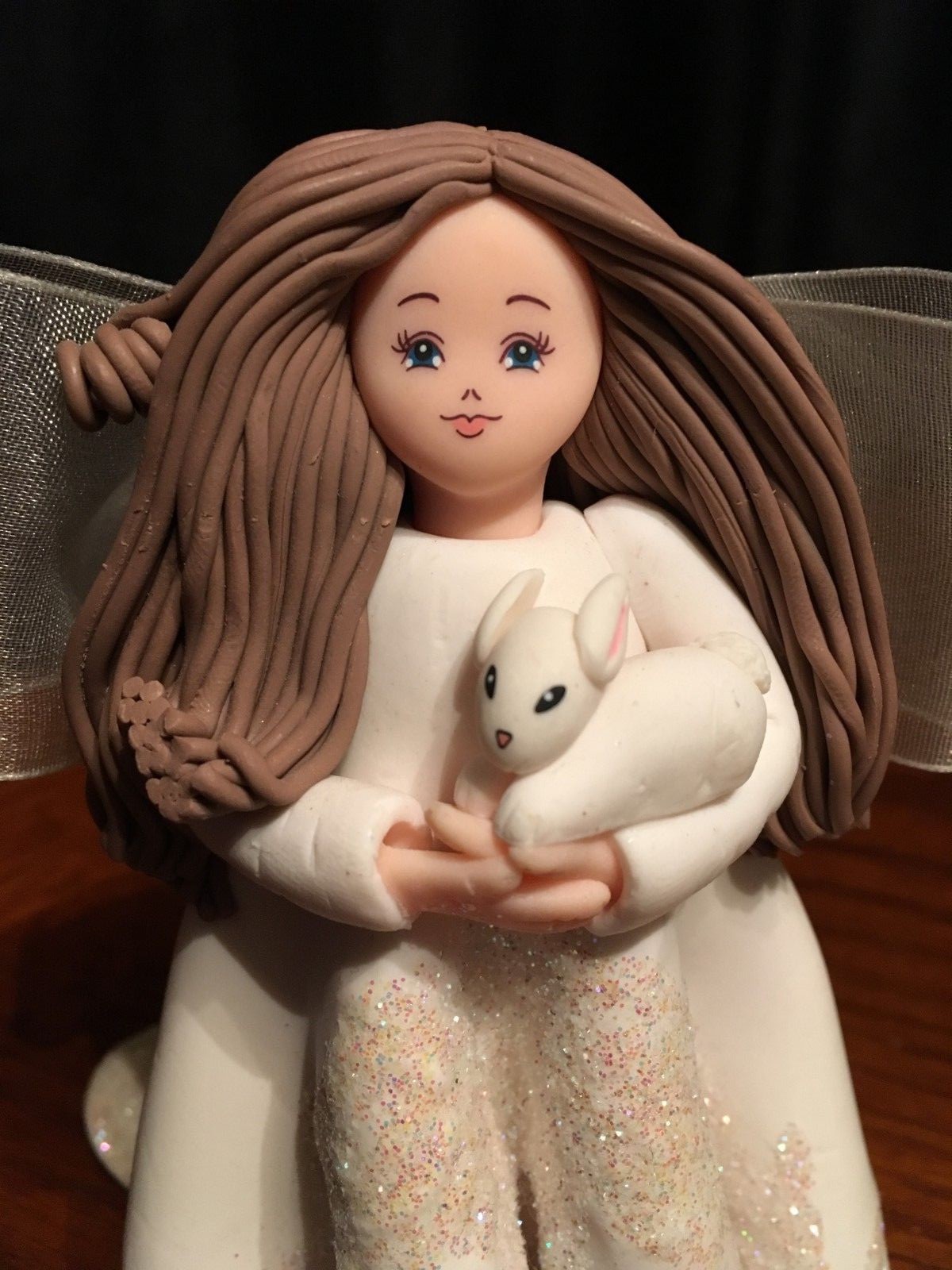 Girl in Sparkling Dress with bow holding Bunny 5