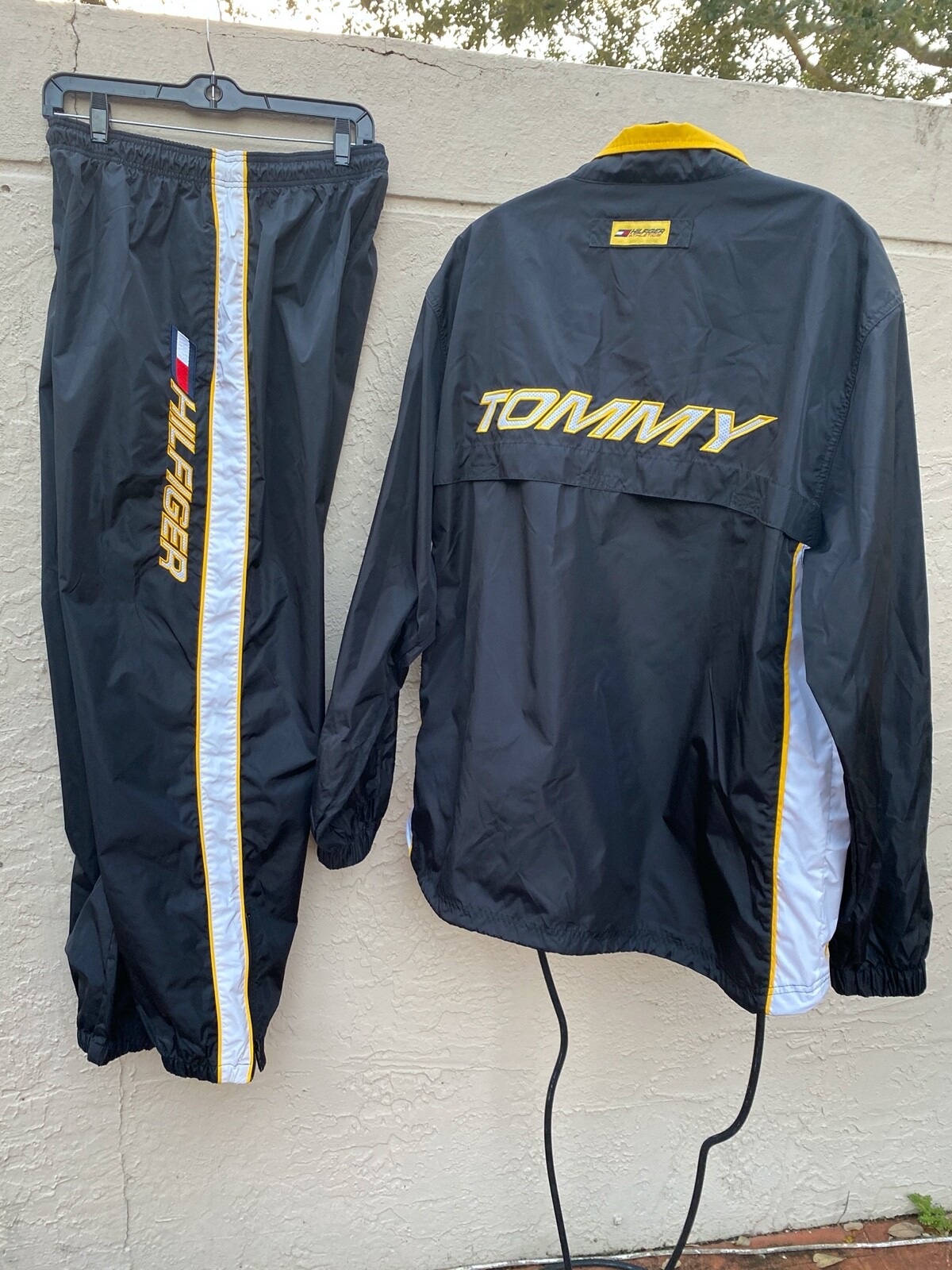 VINTAGE 90's TOMMY HILFIGER ATHLETICS ZIP UP SPELL OUT NYLON VINTAGE 90's TOMMY HILFIGER ATHLETICS ZIP UP SPELL OUT NYLON