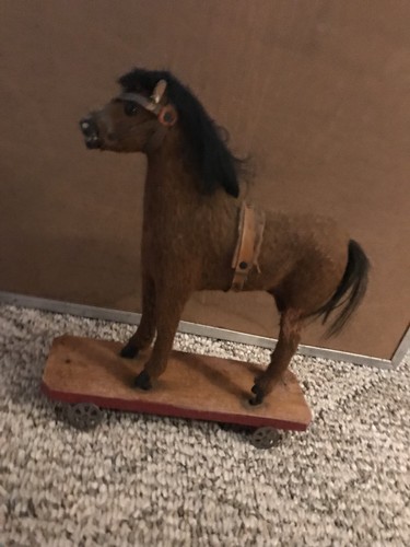 Antique 1800's TOY HORSE  on WHEELS Wood base Iron Wheels