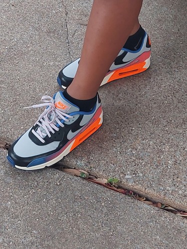 air max 90 total orange on feet