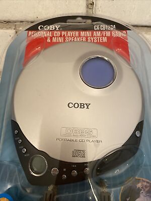 Coby CX-CD1234 Personal CD Player w FM/AM Radio and Mini Speaker system NEW 2006