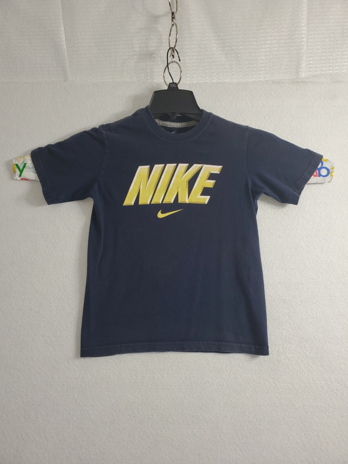 yellow and navy blue nike shirt