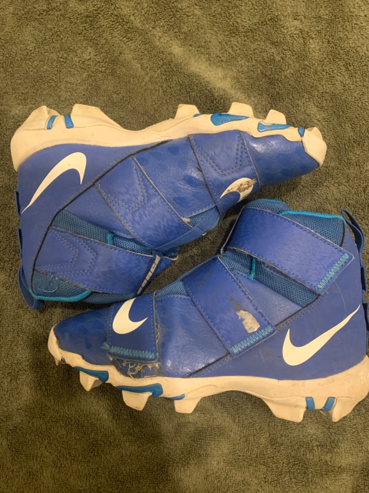 blue and yellow youth football cleats