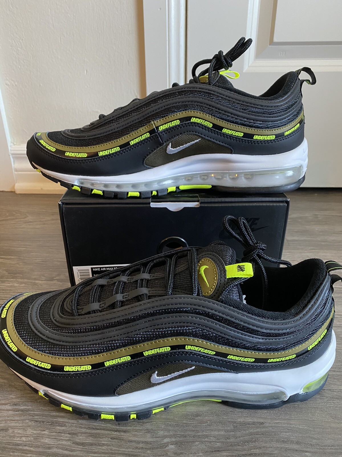 green undefeated air max 97
