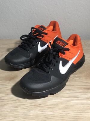 black and orange baseball turf shoes