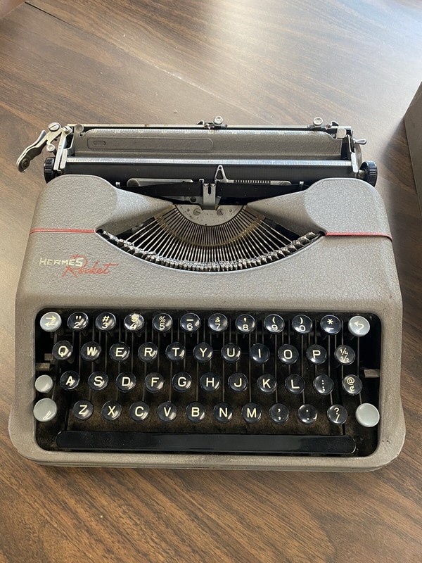 Hermes typewriter photos of Hermes Rocket by year then serial number by