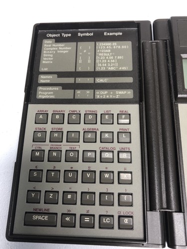 HP 28C Hewlett Packard Scientific Calculator with Manuals