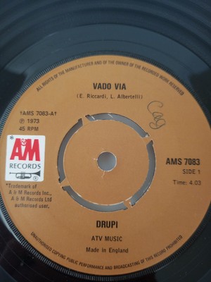 Drupi - Vado via/Un letto e lei on A&M label. Original record. 