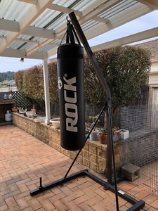 rock boxing bag stand
