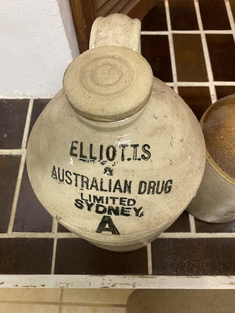 Elliott's & Australian Drug Ltd early demijohn jug with cork