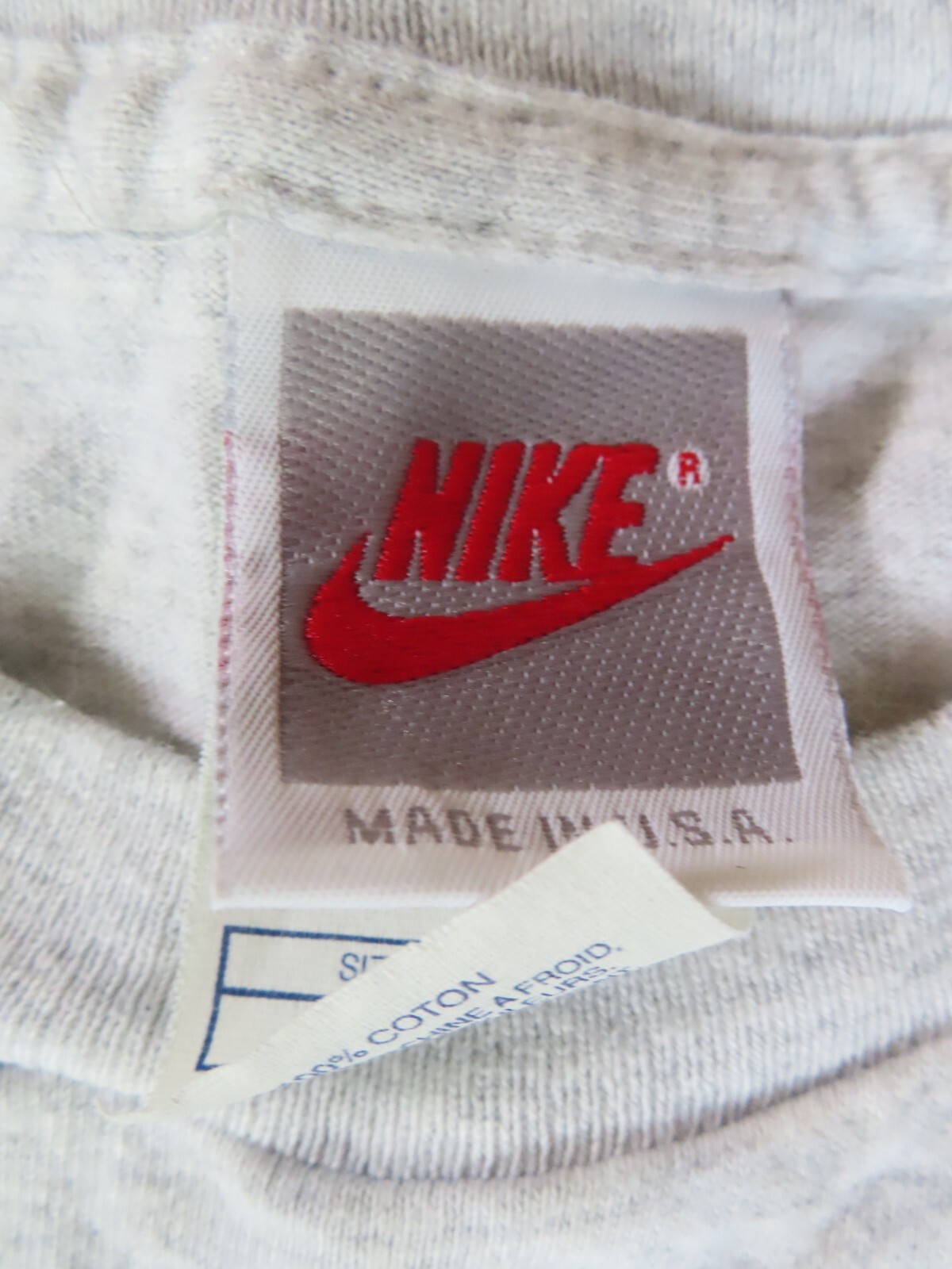 red nike tag