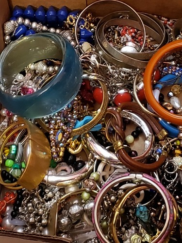 LARGE ASSORTMENT OF BRACELETS  MANY STYLES COLORS THEMES AND SIZES