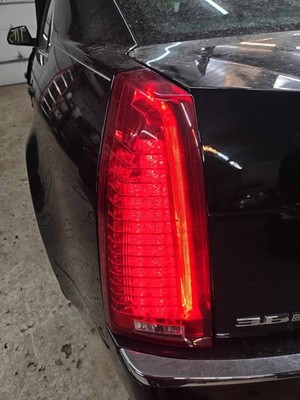 Used Left Tail Light Assembly fits: 2009 Cadillac CTS Red Outer Lens Factory