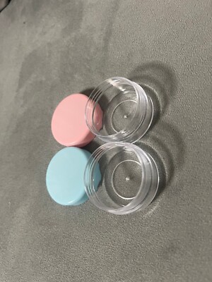 2 pcs empty clear plastic jars used for travel lotions. Blue & Pink