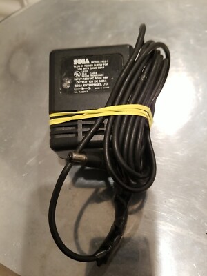 Sega Genisis Game Gear Power Supply (08925) has electric tape on power source !!