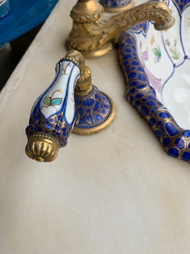 Sherle Wagner sinks With Matching Faucets And Marble Slab