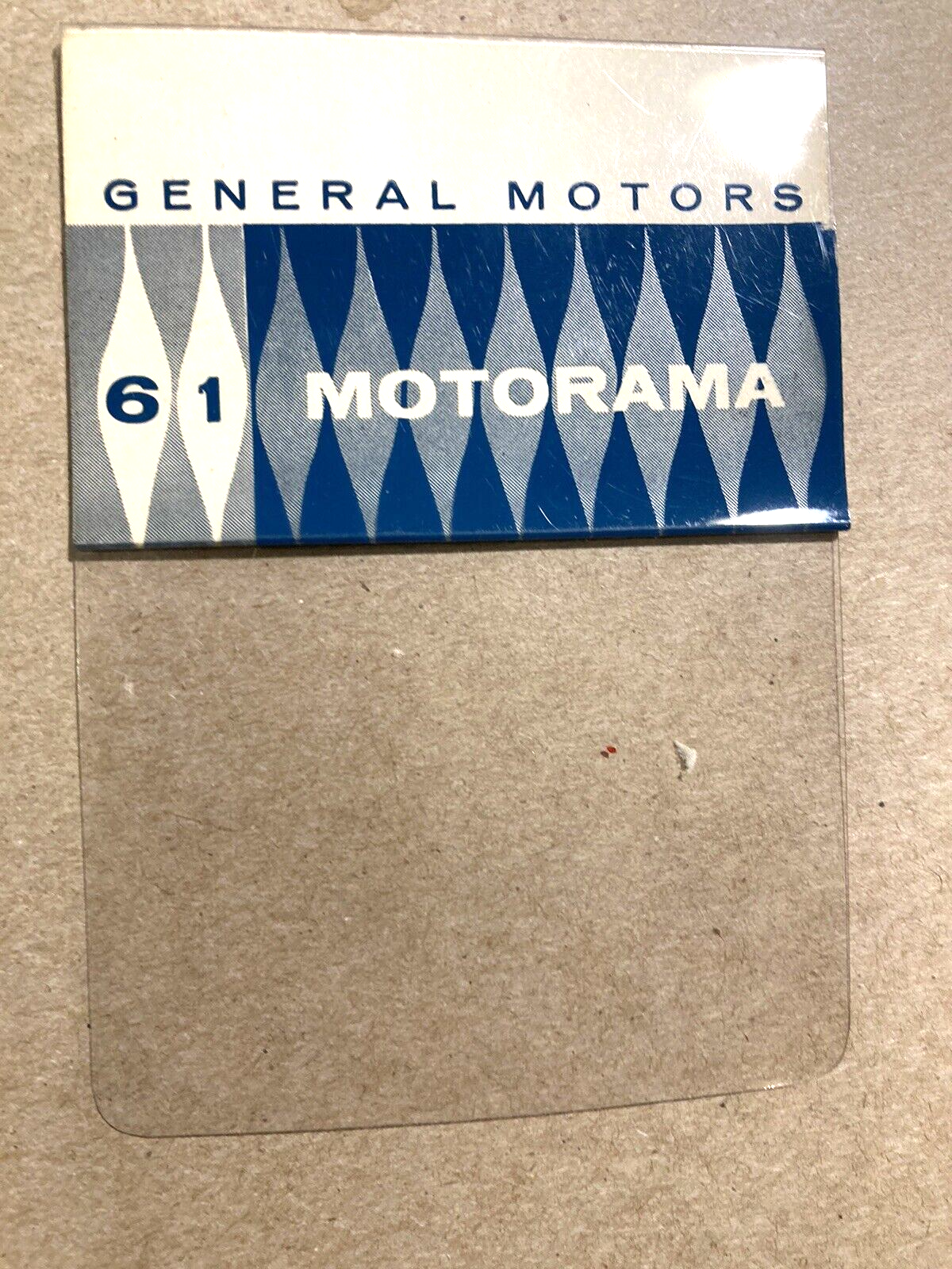 VINTAGE MOTORAMA   1961 GENERAL MOTORS   61 PLASTIC POCKET TAG - DEALER SHOW