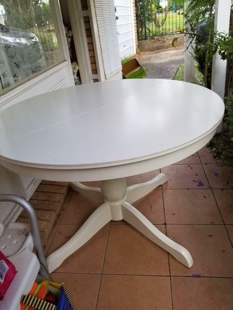 A white round extended IKEA dinning table with 6 chairs | Dining Tables