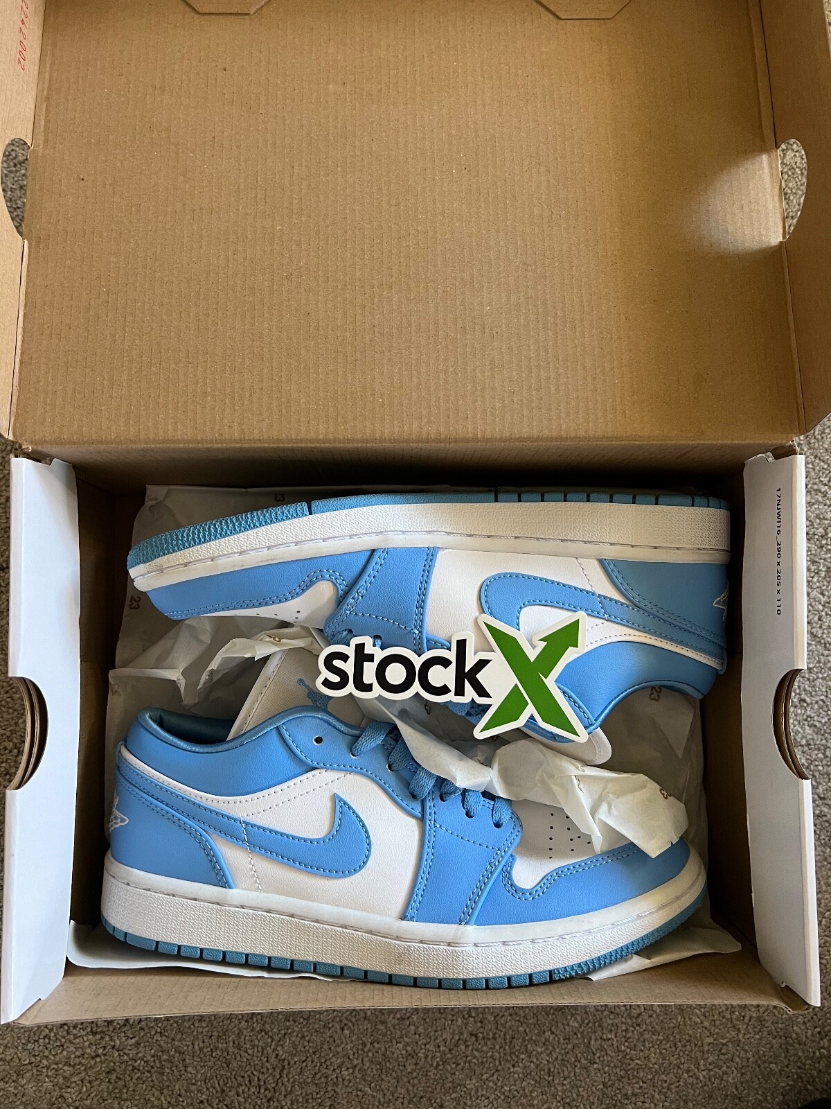 jordan 1 low unc stock x