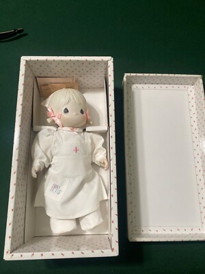 Limited edition precious moments doll Angie, the angel of mercy