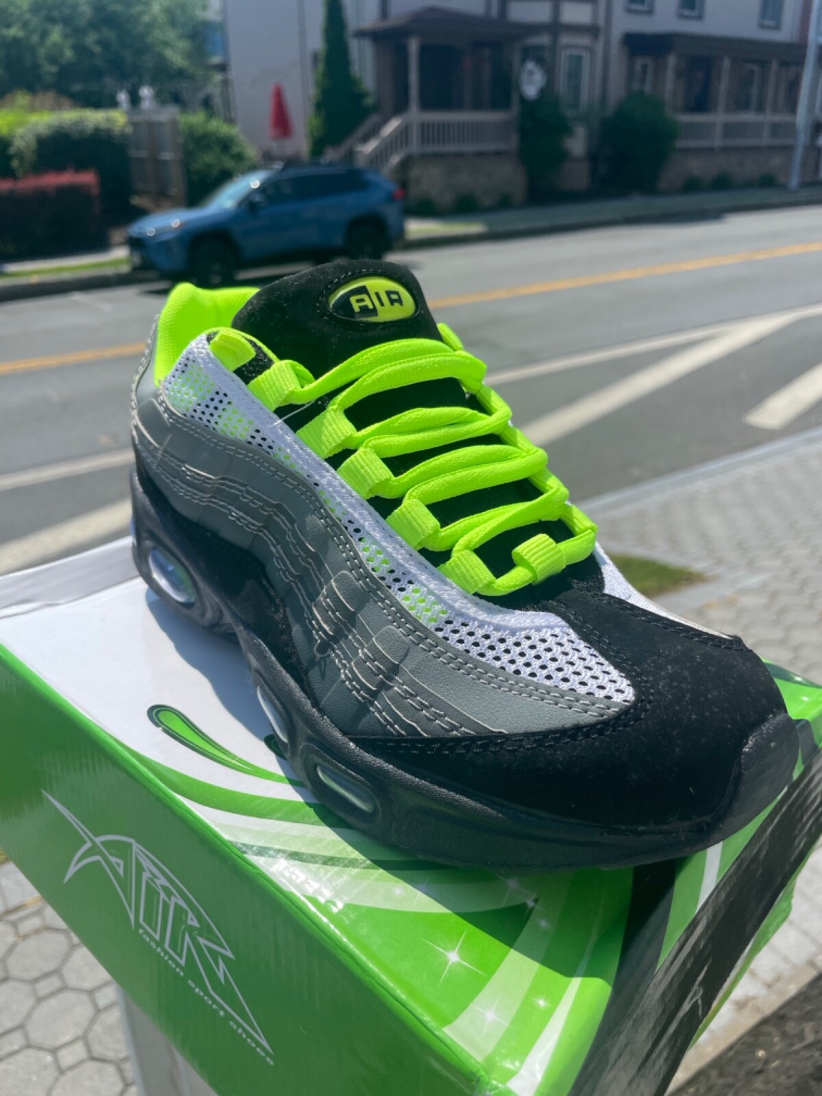 black and neon green nike sneakers