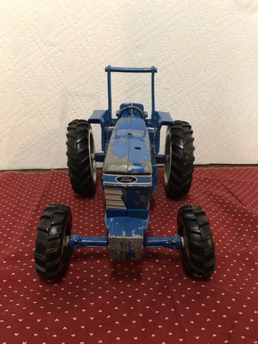 Vintage Ertl Ford 7710 Toy Tractor, Front Wheel Assist and Roll Bar 1/16 scale
