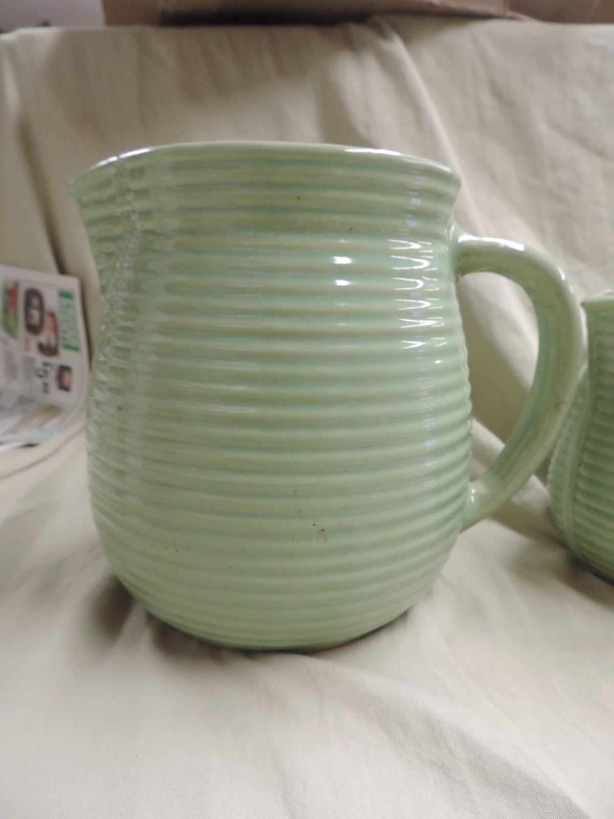Two Vintage Western Stoneware Ribbed Pottery Pitchers Large and Small