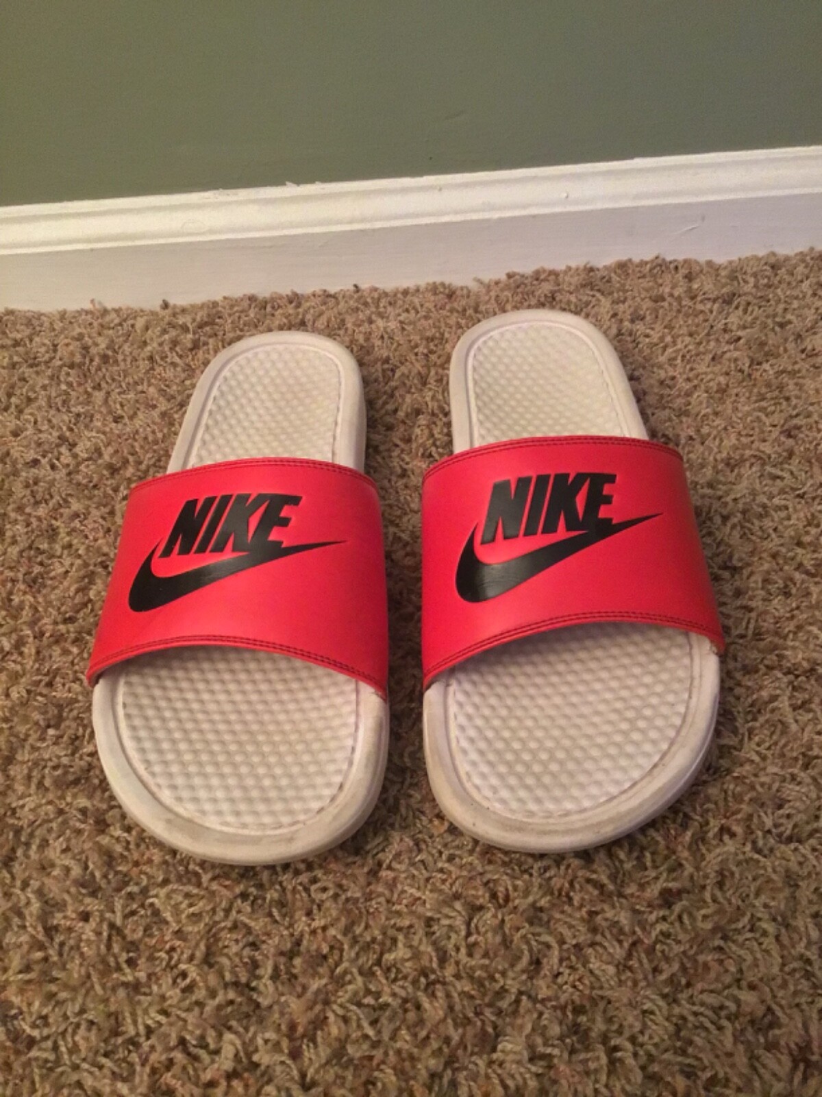 red and white nike slippers