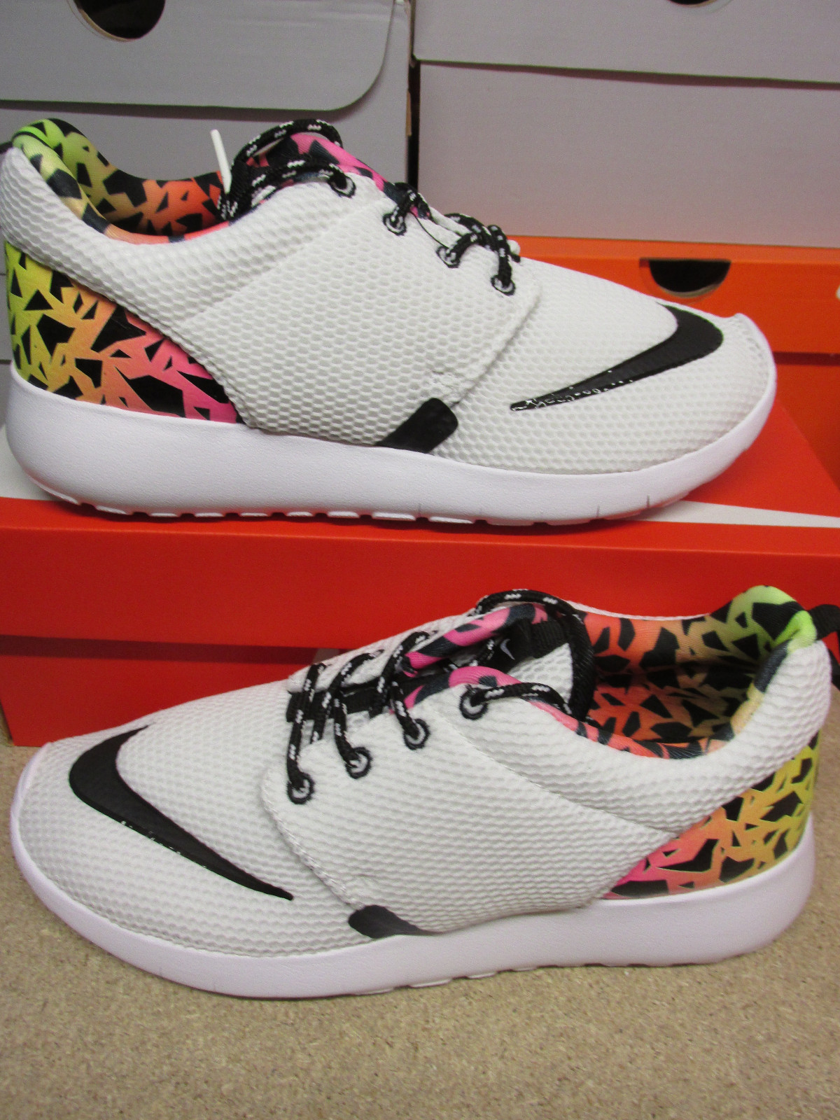 nike roshe pink and white trainers