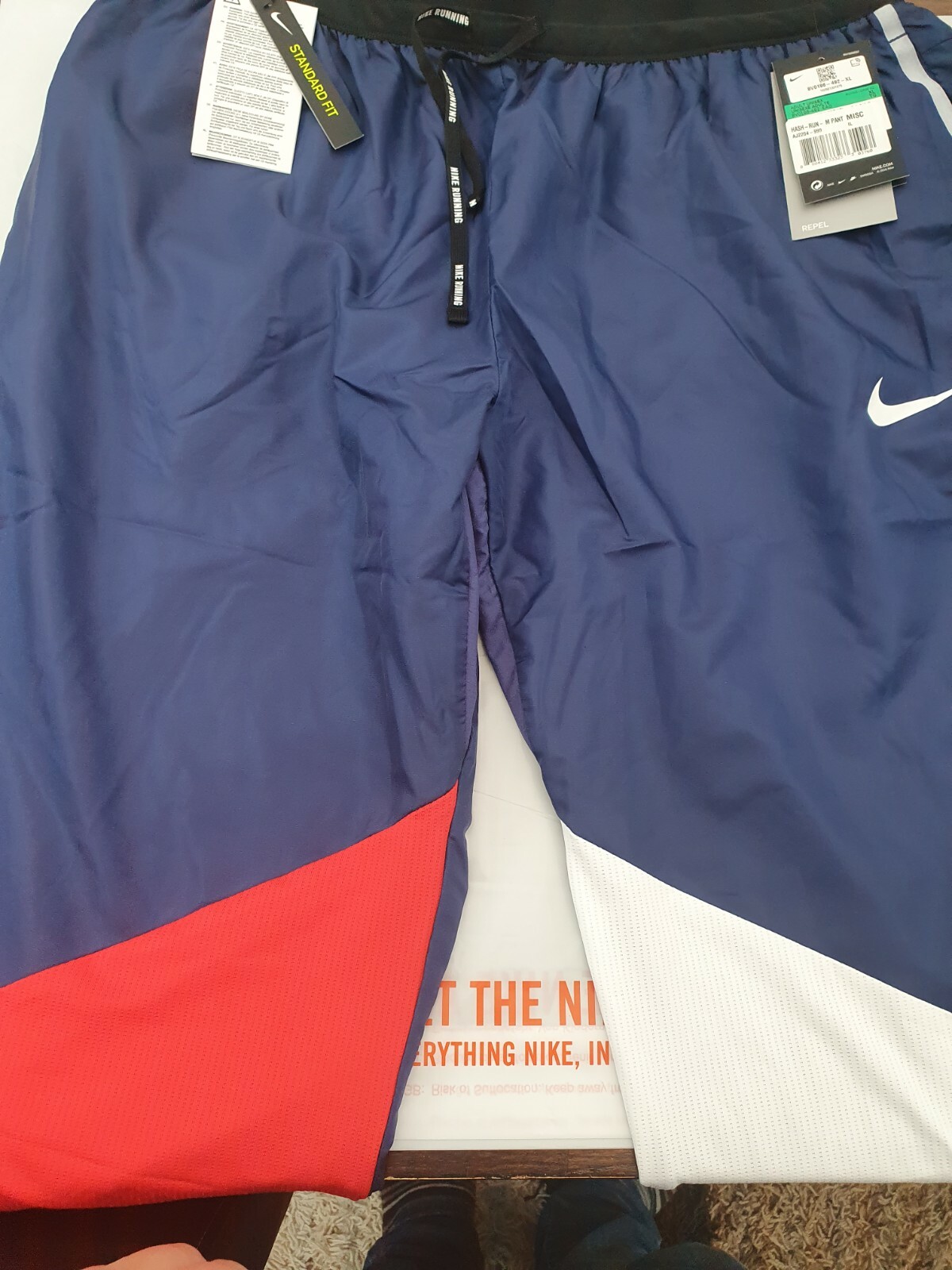red white and blue nike joggers