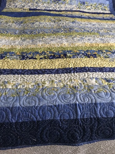 Twin Quilt Jellyroll blue yellow green print 65x76 flannel back blue & white