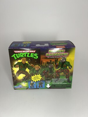 Playmates TMNT Teenage Mutant Ninja Turtles Mutatin' Thug to Rocksteady Figure