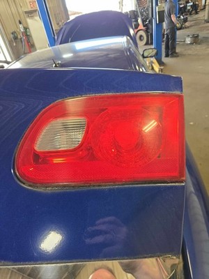 Used Right Tail Light Assembly fits: 2006 Buick Lucerne lid mounted Right Grade